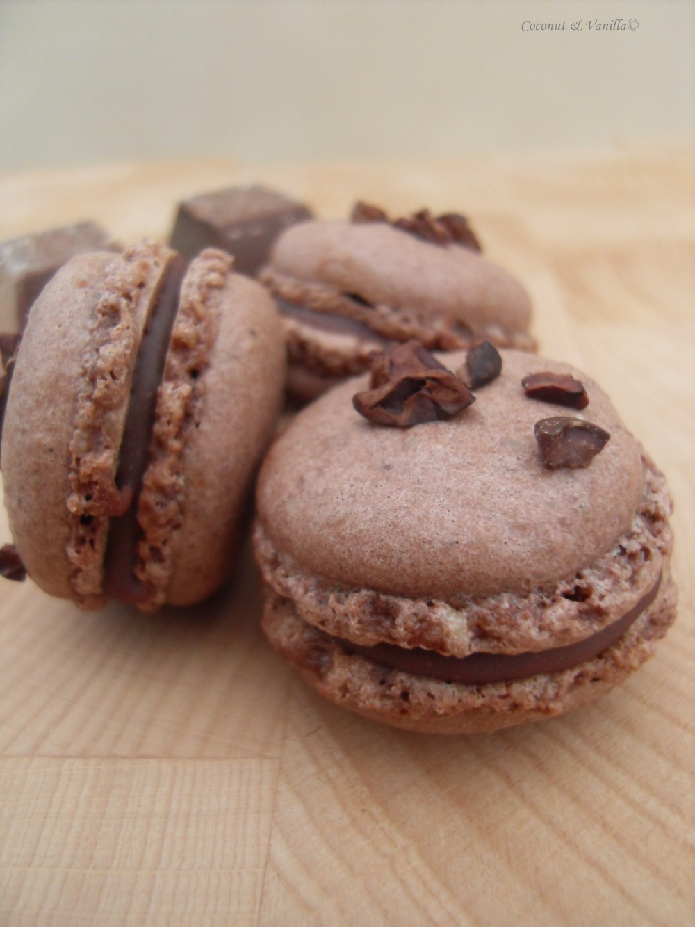 chocolate macarons with raspberry filling